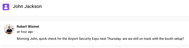Team chat conversation showing a message about checking an Airport Security Expo booth setup.