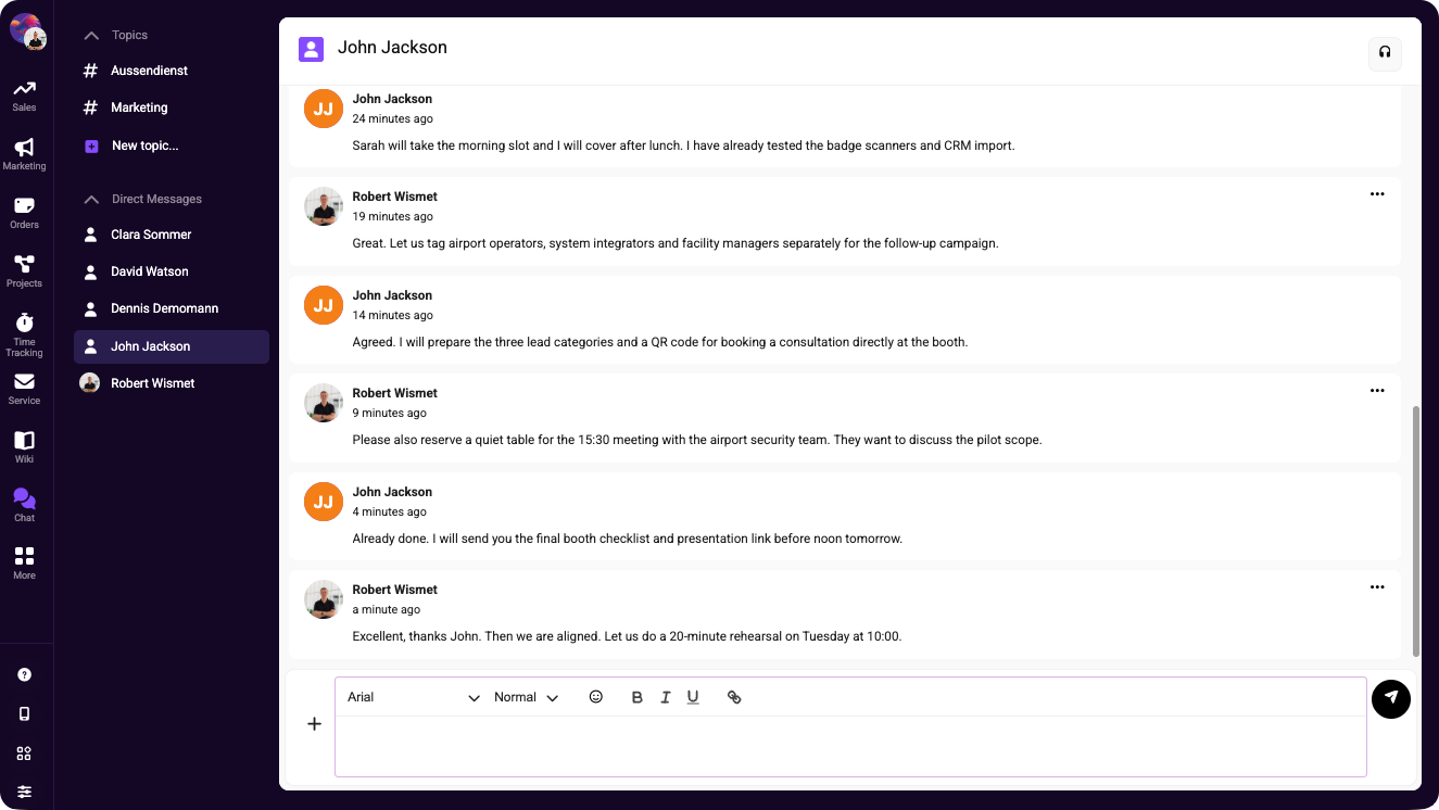Team chat interface with an open direct message conversation between John Jackson and Robert Wismet.